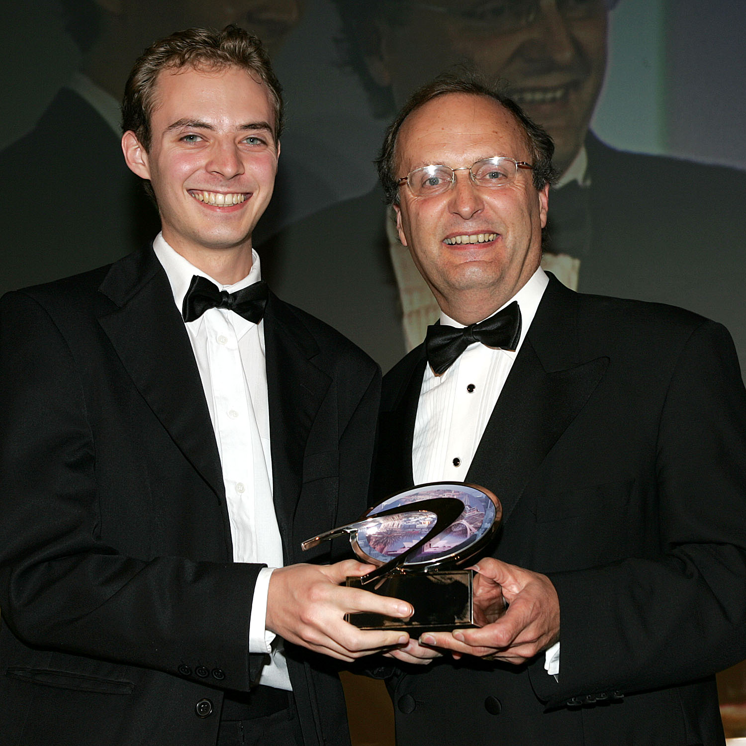 Marc receiving his award