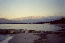 Sunset reflected in the mountains over the bay of Calvi