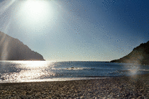 Boat on the bay at Plage de Tuara, nr Girolata