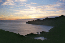 Sunset over Girolata and its castle