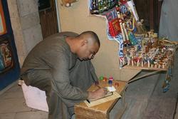 Hard at work on his papyrus